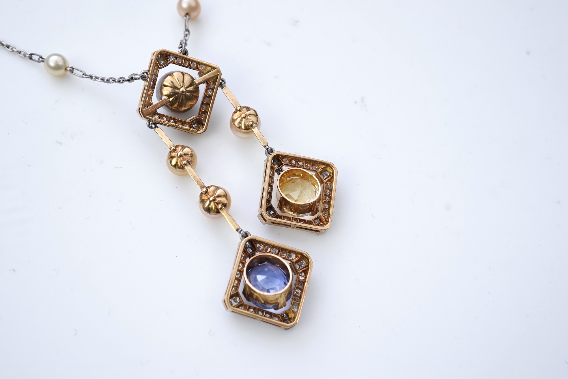 An Art Deco sapphire, natural pearl and diamond necklace, circa 1920
